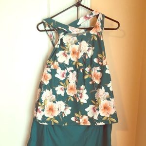 Floral tankini swim top and solid teal swim skirt.